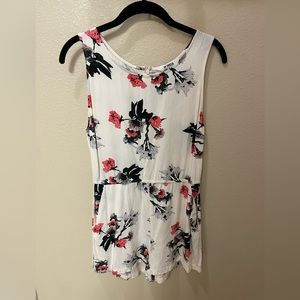BB Dakota romper w pockets. Size small, white w pink, grey, black floral pattern